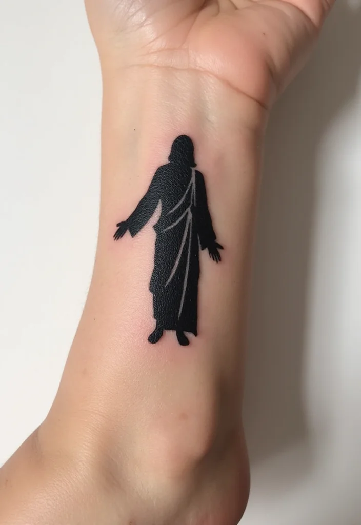 15 Jaw-Dropping Jesus Tattoos That Will Fill You with Hope! - 5. Minimalist Jesus Silhouette 1